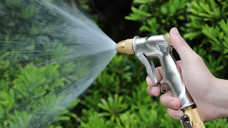 Spraying with water