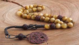 Muhimman ma'anonin ganin rosary a mafarki na Ibn Sirin